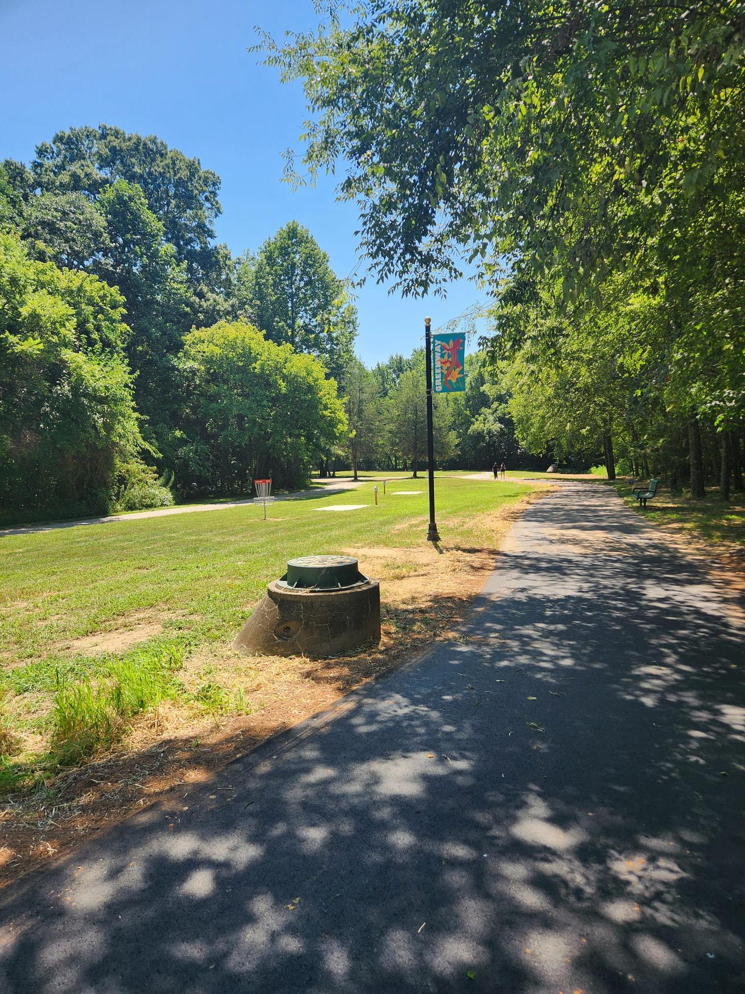 Greenway reopened after completion of stream bank work.